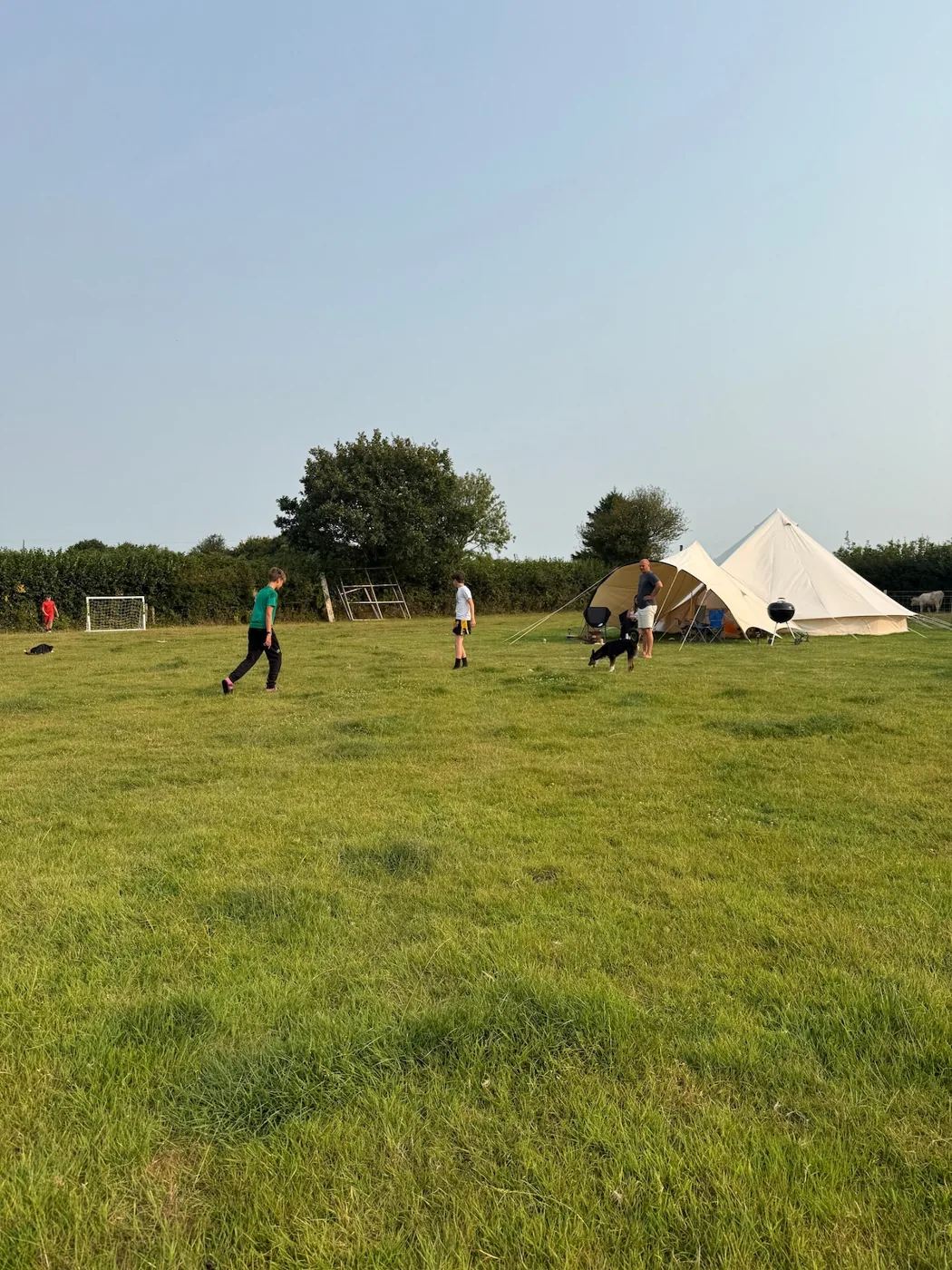 Space to play on the open field, with the tents beyond